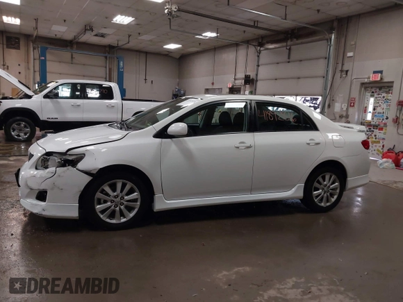 2010 Toyota Corolla with VIN 2T1BU4EEXAC448424, listed as a IAAI auction lot 41892816 with 158,538 mi miles. Bid and sale history available at carsss.com. Image 14.