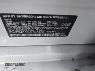 2019 BMW X7 xDrive50i z VIN 5UXCX4C53KLB40280, wystawiony jako IAAI lot #39936228 z przebiegiem Nie podano mil oraz . Historia ofert i sprzedaży dostępna na DreamBid. Obrazek 9.