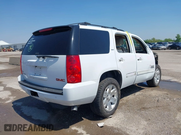 2011 GMC Yukon SLT z VIN 1GKS1CE00BR210794, wystawiony jako IAAI lot #41958998 z przebiegiem 225 407 mil mil oraz . Historia ofert i sprzedaży dostępna na DreamBid. Obrazek 4.