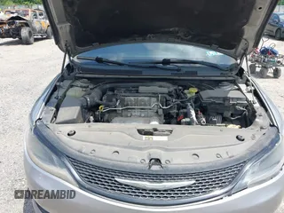 2015 Chrysler 200 S with VIN 1C3CCCBB8FN565732, listed as a IAAI auction lot 42754941 with 114,731 mi miles and . Bid and sale history available at DreamBid. Image 10.