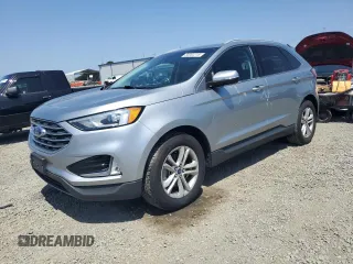 2020 Ford Edge SEL с VIN 2FMPK3J9XLBA50264, выставлен на аукционе Copart как лот 56002215 с пробегом 77 520 миль миль и Списание • Salvage title. История ставок и продаж доступна на DreamBid. Изображение 1.