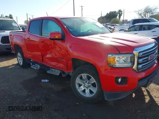 2017 GMC Canyon 2WD SLE z VIN 1GTG5CEN4H1280274, wystawiony jako IAAI lot #41656414 z przebiegiem 106 746 mil mil oraz . Historia ofert i sprzedaży dostępna na DreamBid. Obrazek 1.
