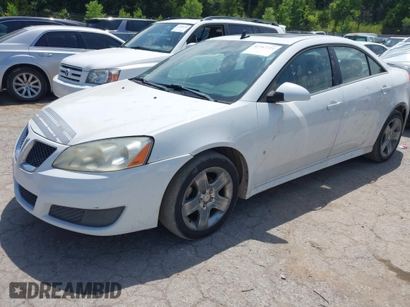 2009 Pontiac G6 1SB z VIN 1G2ZJ57B094267612, wystawiony jako IAAI lot #42467721 z przebiegiem 160 532 mil mil oraz . Historia ofert i sprzedaży dostępna na DreamBid. Obrazek 2.