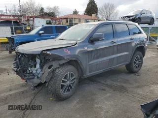 2018 Jeep Grand Cherokee Trailhawk with VIN 1C4RJFLT7JC148899, listed as a Copart auction lot 46345235 with 59,230 mi miles and Salvage Title. Bid and sale history available at carsss.com. Image 1.
