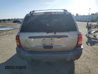 1999 Jeep Grand Cherokee Laredo z VIN 1J4GW58NXXC704719, wystawiony jako Copart lot #49546395 z przebiegiem 276 716 mil mil oraz Czysty tytuł • Clean title. Historia ofert i sprzedaży dostępna na DreamBid. Obrazek 6.