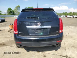 2015 Cadillac SRX Performance Collection with VIN 3GYFNFE33FS586965, listed as a Copart auction lot 54919505 with 93,810 mi miles and Salvage title. Bid and sale history available at DreamBid. Image 6.
