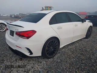 2021 Mercedes-Benz A 35 AMG z VIN W1K3G5BB2MJ266887, wystawiony jako IAAI lot #41509086 z przebiegiem 90 459 mil mil oraz . Historia ofert i sprzedaży dostępna na DreamBid. Obrazek 4.