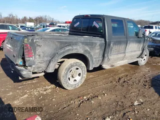 2001 Ford Super Duty F-250 XL with VIN 1FTNW21S71ED02471, listed as a IAAI auction lot 41404650 with 248,474 mi miles. Bid and sale history available at carsss.com. Image 4.