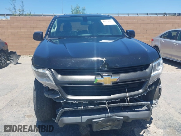 2019 Chevrolet Colorado 2WD LT z VIN 1GCGSCEA0K1105615, wystawiony jako IAAI lot #42279569 z przebiegiem 178 329 mil mil oraz . Historia ofert i sprzedaży dostępna na DreamBid. Obrazek 12.