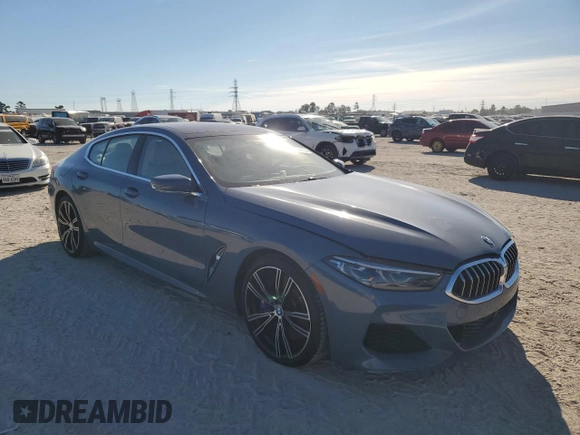 2022 BMW 8 Series M850i с VIN WBAGV8C06NCH25022, выставлен на аукционе Copart как лот 82894104 с пробегом 26 864 миль миль и На запчасти • Non repairable. История ставок и продаж доступна на DreamBid. Изображение 4.