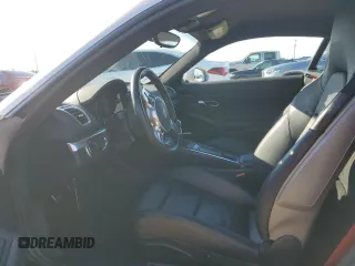 2014 Porsche Cayman S с VIN WP0AB2A89EK190939, выставлен на аукционе Copart как лот 73934334 с пробегом 22 719 миль миль и Списание • Salvage title. История ставок и продаж доступна на DreamBid. Изображение 7.