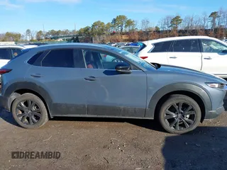 2023 Mazda CX-30 S Carbon Edition with VIN 3MVDMBCM3PM579345, listed as a IAAI auction lot 41689892 with 18,621 mi miles and . Bid and sale history available at DreamBid. Image 13.