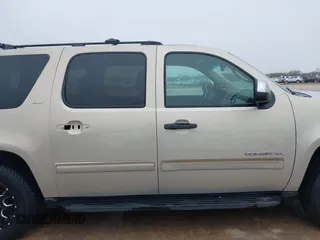 2011 GMC Yukon XL SLT with VIN 1GKS1KE01BR160725, listed as a IAAI auction lot 41587693 with 302,661 mi miles and . Bid and sale history available at carsss.com. Image 14.