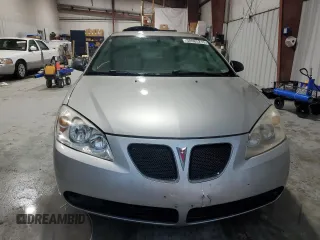 2006 Pontiac G6 with VIN 1G2ZF55B664225896, listed as a Copart auction lot 50985215 with 115,026 mi miles and Salvage title. Bid and sale history available at DreamBid. Image 5.