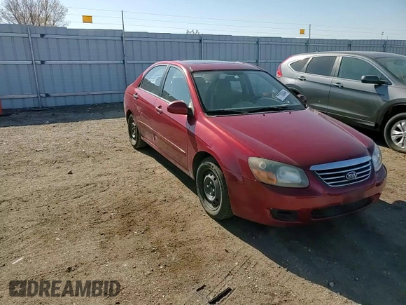 2009 Kia Spectra EX with VIN KNAFE221395656476, listed as a Copart auction lot 77700844 with 90,079 mi miles and Salvage Title. Bid and sale history available at carsss.com. Image 10.