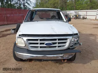 1999 Ford F-150 Work Series with VIN 1FTZF1728XKA04105, listed as a IAAI auction lot 41856047 with 176,890 mi miles. Bid and sale history available at carsss.com. Image 6.