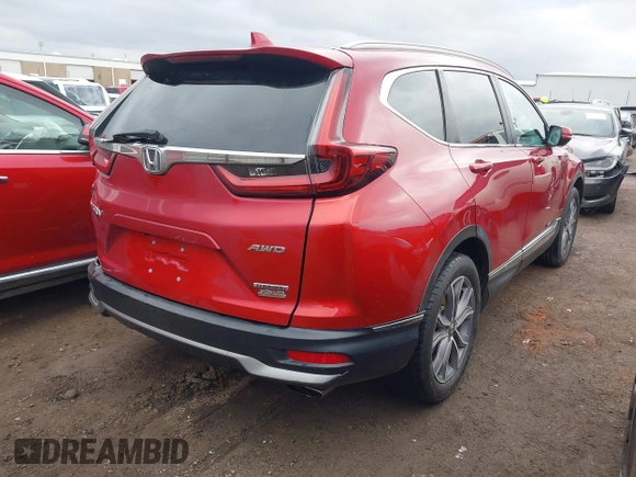 2020 Honda CR-V Touring with VIN 5J6RW2H94LL017434, listed as a IAAI auction lot 41556184 with 97,016 mi miles and . Bid and sale history available at DreamBid. Image 4.