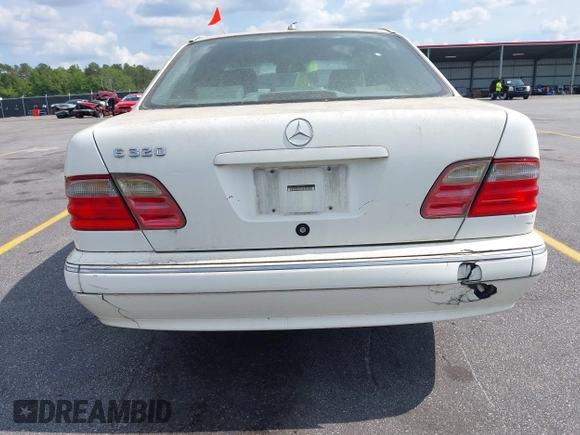 2002 Mercedes-Benz E-Class with VIN WDBJF65J22B432263, listed as a IAAI auction lot 42130545 with 220,852 mi miles. Bid and sale history available at carsss.com. Image 14.