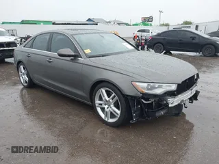 2014 Audi A6 Premium Plus z VIN WAUGFAFC3EN087176, wystawiony jako IAAI lot #42117602 z przebiegiem 53 571 mil mil oraz . Historia ofert i sprzedaży dostępna na DreamBid. Obrazek 1.