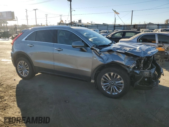 2024 Cadillac XT4 FWD Premium Luxury z VIN 1GYFZCR47RF126643, wystawiony jako Copart lot #50268745 z przebiegiem 24 583 mil mil oraz Czysty tytuł • Clean title. Historia ofert i sprzedaży dostępna na DreamBid. Obrazek 4.