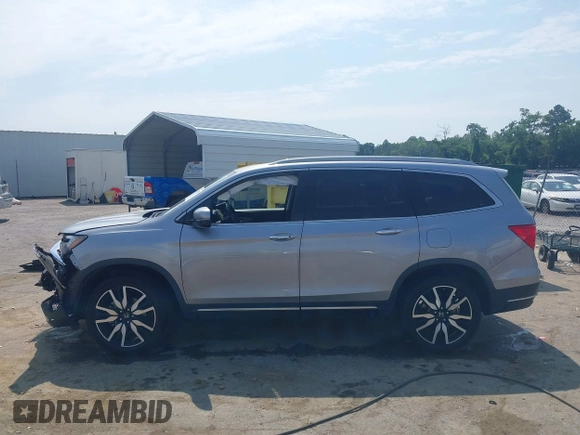 2019 Honda Pilot Elite with VIN 5FNYF6H08KB025449, listed as a IAAI auction lot 42450139 with 98,368 mi miles and . Bid and sale history available at DreamBid. Image 14.