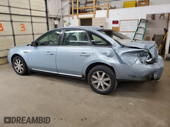 2008 Ford Taurus SEL with VIN 1FAHP24W38G130517, listed as a Copart auction lot 53086395 with 128,777 mi miles and Salvage Title. Bid and sale history available at carsss.com. Image 2.