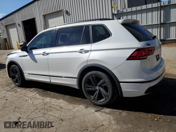 2023 Volkswagen Tiguan SE R-Line Black with VIN 3VVCB7AX6PM001044, listed as a Copart auction lot 47365565 with 20,059 mi miles and Salvage title. Bid and sale history available at DreamBid. Image 2.