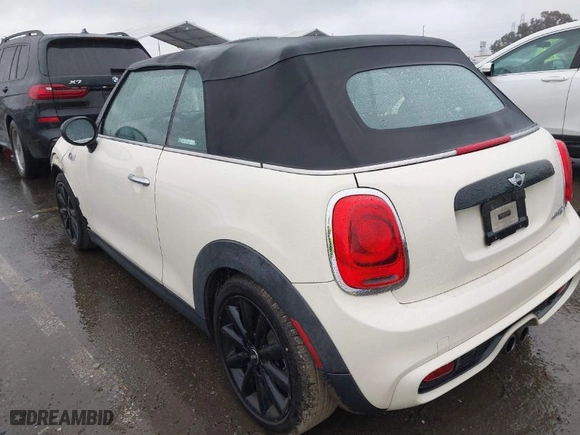 2016 MINI Cooper Convertible S with VIN WMWWG9C52G3C21934, listed as a IAAI auction lot 41569029 with 102,042 mi miles. Bid and sale history available at carsss.com. Image 3.
