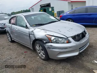 2009 Honda Accord EX with VIN 1HGCP26759A140420, listed as a IAAI auction lot 42386109 with 208,813 mi miles and . Bid and sale history available at DreamBid. Image 1.