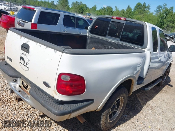 2002 Ford F-150 XL with VIN 1FTRX08L12KB49882, listed as a IAAI auction lot 42121639 with Not provided miles and . Bid and sale history available at DreamBid. Image 4.