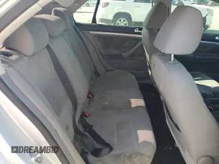 2009 Volkswagen Jetta S z VIN 3VWJM71K79M167562, wystawiony jako Copart lot #80546594 z przebiegiem 196 891 mil mil oraz Szkoda całkowita • Salvage title. Historia ofert i sprzedaży dostępna na DreamBid. Obrazek 10.