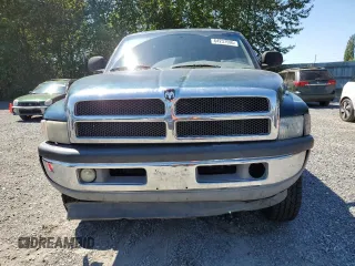 1999 Dodge 2500 with VIN 1B7KF23W2XJ539940, listed as a Copart auction lot 64237595 with 211,718 mi miles and Salvage title. Bid and sale history available at DreamBid. Image 5.