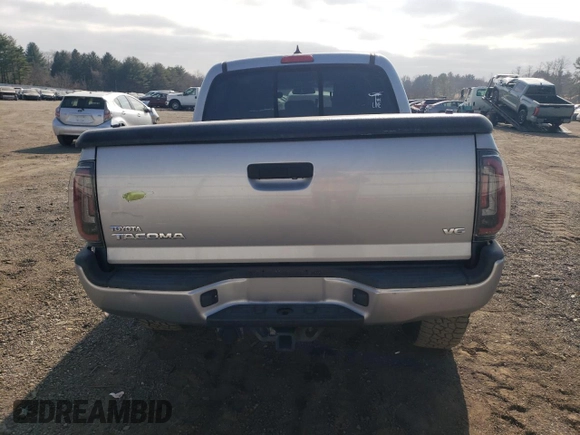 2015 Toyota Tacoma with VIN 3TMLU4EN6FM183441, listed as a Copart auction lot 49060715 with 100,328 mi miles and Salvage Title. Bid and sale history available at carsss.com. Image 6.