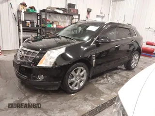 2011 Cadillac SRX Performance Collection with VIN 3GYFNEEY9BS675746, listed as a IAAI auction lot 41735676 with 113,079 mi miles and . Bid and sale history available at carsss.com. Image 2.