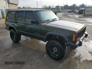 1997 Jeep Cherokee SE with VIN 1J4FJ28S5VL551419, listed as a Copart auction lot 42241185 with 239,699 mi miles and Salvage Title. Bid and sale history available at carsss.com. Image 4.