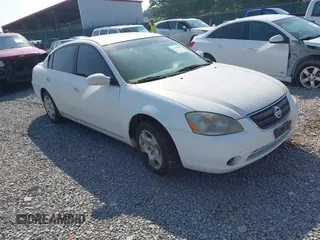 2002 Nissan Altima SL z VIN 1N4AL11DX2C279807, wystawiony jako IAAI lot #42482548 z przebiegiem 208 233 mil mil oraz . Historia ofert i sprzedaży dostępna na DreamBid. Obrazek 1.