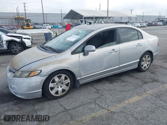 2006 Honda Civic LX with VIN 1HGFA165X6L144003, listed as a IAAI auction lot 42115624 with 310,261 mi miles and . Bid and sale history available at DreamBid. Image 2.