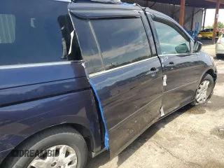 2009 Honda Odyssey LX z VIN 5FNRL38209B051664, wystawiony jako Copart lot #56710125 z przebiegiem 123 mil mil oraz Nie do naprawy • Non repairable. Historia ofert i sprzedaży dostępna na DreamBid. Obrazek 11.