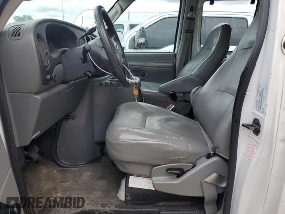 2004 Ford Econoline Passenger XL with VIN 1FBSS31L84HA53604, listed as a Copart auction lot 60685995 with 165,114 mi miles and Clean title. Bid and sale history available at DreamBid. Image 7.