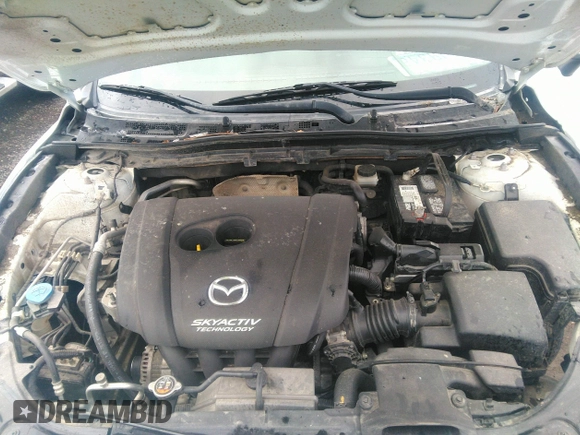 2015 Mazda 3 i Grand Touring z VIN JM1BM1W75F1232796, wystawiony jako IAAI lot #39976305 z przebiegiem 69 161 mil mil oraz . Historia ofert i sprzedaży dostępna na DreamBid. Obrazek 10.
