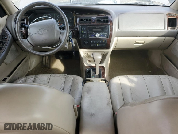 1998 Toyota Avalon XL with VIN 4T1BF18B0WU284522, listed as a Copart auction lot 45590925 with 278,690 mi miles and Salvage Title. Bid and sale history available at DreamBid. Image 8.