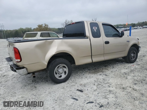 1999 Ford F-150 with VIN 1FTZX1721XNA37541, listed as a Copart auction lot 51588415 with 267,071 mi miles and Salvage title. Bid and sale history available at DreamBid. Image 3.