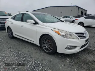 2013 Hyundai Azera z VIN KMHFH4JG2DA277122, wystawiony jako Copart lot #59899755 z przebiegiem 210 601 mil mil oraz Czysty tytuł • Clean title. Historia ofert i sprzedaży dostępna na DreamBid. Obrazek 4.