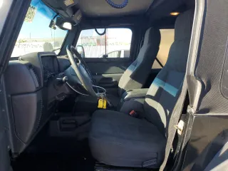 2005 Jeep Wrangler Rubicon with VIN 1J4FA69SX5P343826, listed as a Copart auction lot 69074374 with 179,610 mi miles and Salvage Title. Bid and sale history available at carsss.com. Image 7.