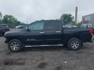 2011 Nissan Titan Pro-4X with VIN 1N6BA0ECXBN319157, listed as a IAAI auction lot 42456725 with 169,434 mi miles and . Bid and sale history available at DreamBid. Image 14.