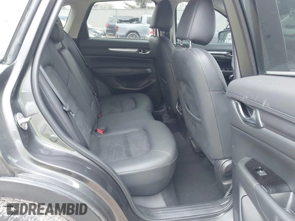 2020 Mazda CX-5 Touring with VIN JM3KFBCM2L0850855, listed as a IAAI auction lot 42147339 with 75,955 mi miles and . Bid and sale history available at carsss.com. Image 8.