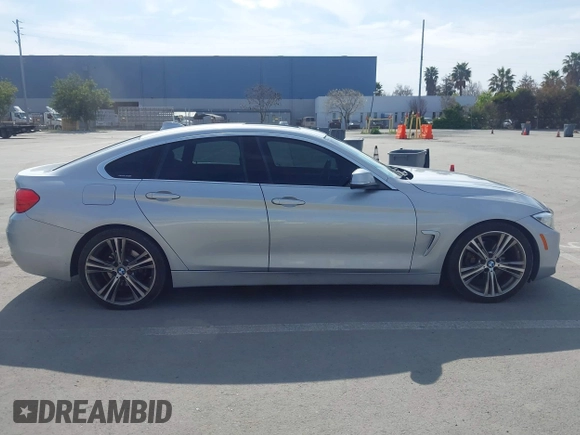2016 BMW 4 Series 428i with VIN WBA4A9C55GG695469, listed as a IAAI auction lot 41753857 with 90,692 mi miles. Bid and sale history available at carsss.com. Image 13.
