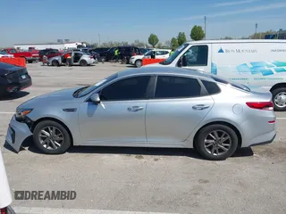 2019 Kia Optima LX with VIN 5XXGT4L39KG323046, listed as a IAAI auction lot 42035766 with 164,643 mi miles and . Bid and sale history available at DreamBid. Image 14.