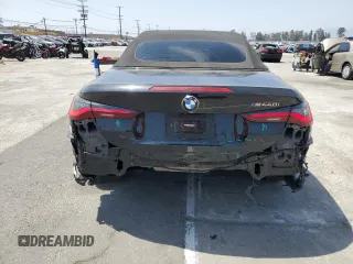 2022 BMW 4 Series M440i with VIN WBA53AT01NCJ52404, listed as a Copart auction lot 54464474 with 16,880 mi miles and Salvage title. Bid and sale history available at DreamBid. Image 6.
