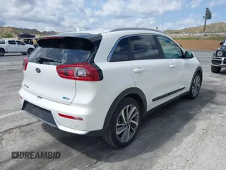 2017 Kia Niro Touring with VIN KNDCE3LC3H5070998, listed as a IAAI auction lot 41448651 with 54,760 mi miles. Bid and sale history available at carsss.com. Image 4.
